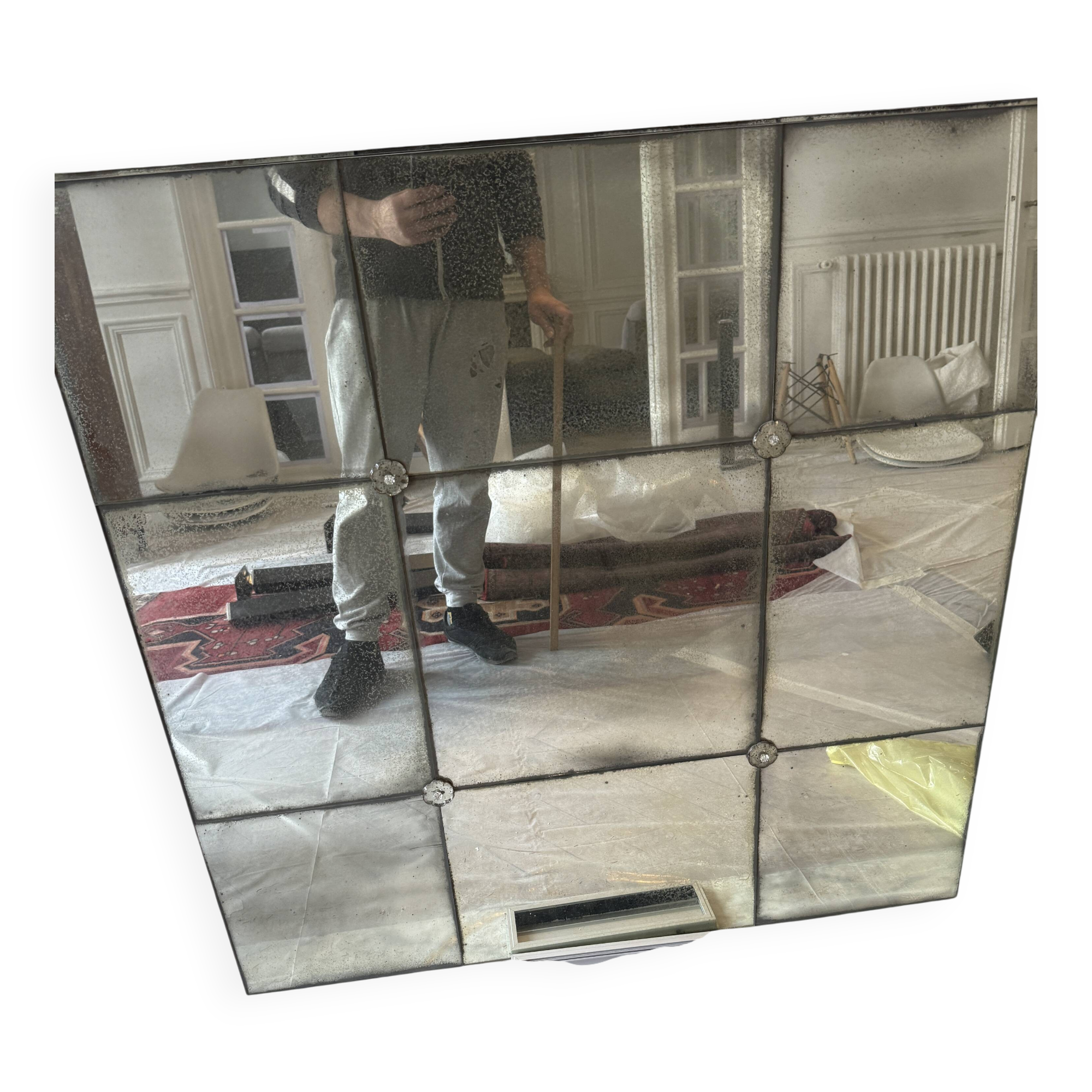 Large industrial-style mirror with glazing bars.