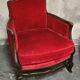 Pair of Louis XV style bergère armchairs in red velvet.