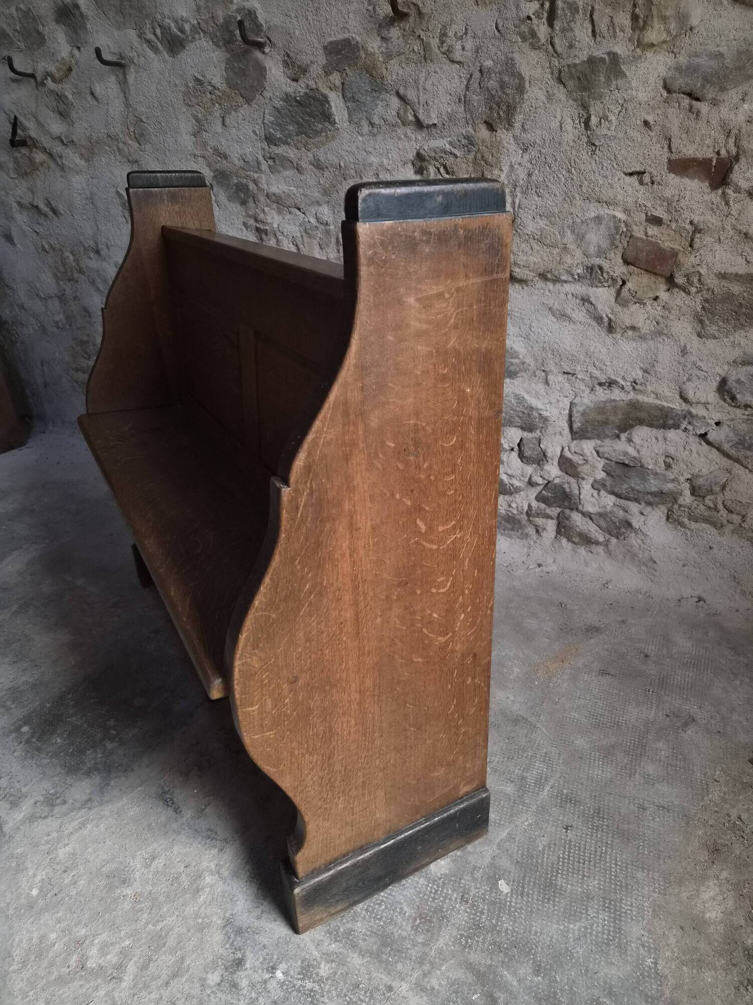 Antique church bench in oak, circa 1900–1920