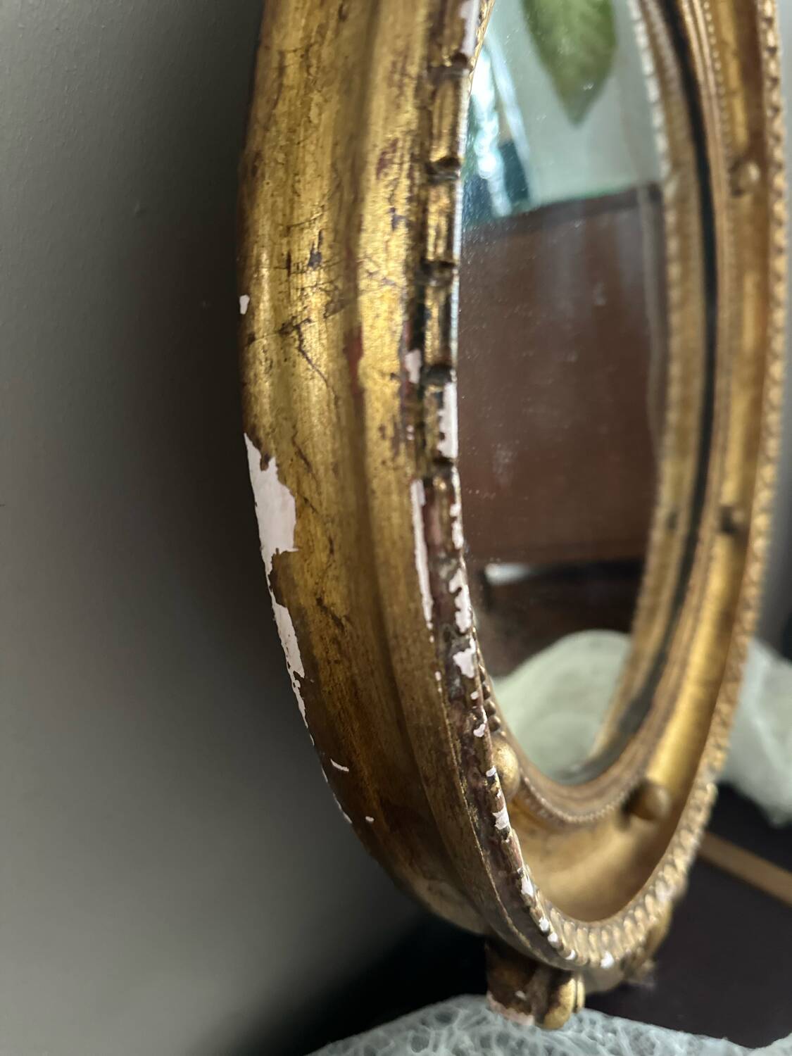 Antique gilded mirror decorated with an eagle