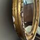 Antique gilded mirror decorated with an eagle