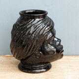 Molded glass vase, nubian's head