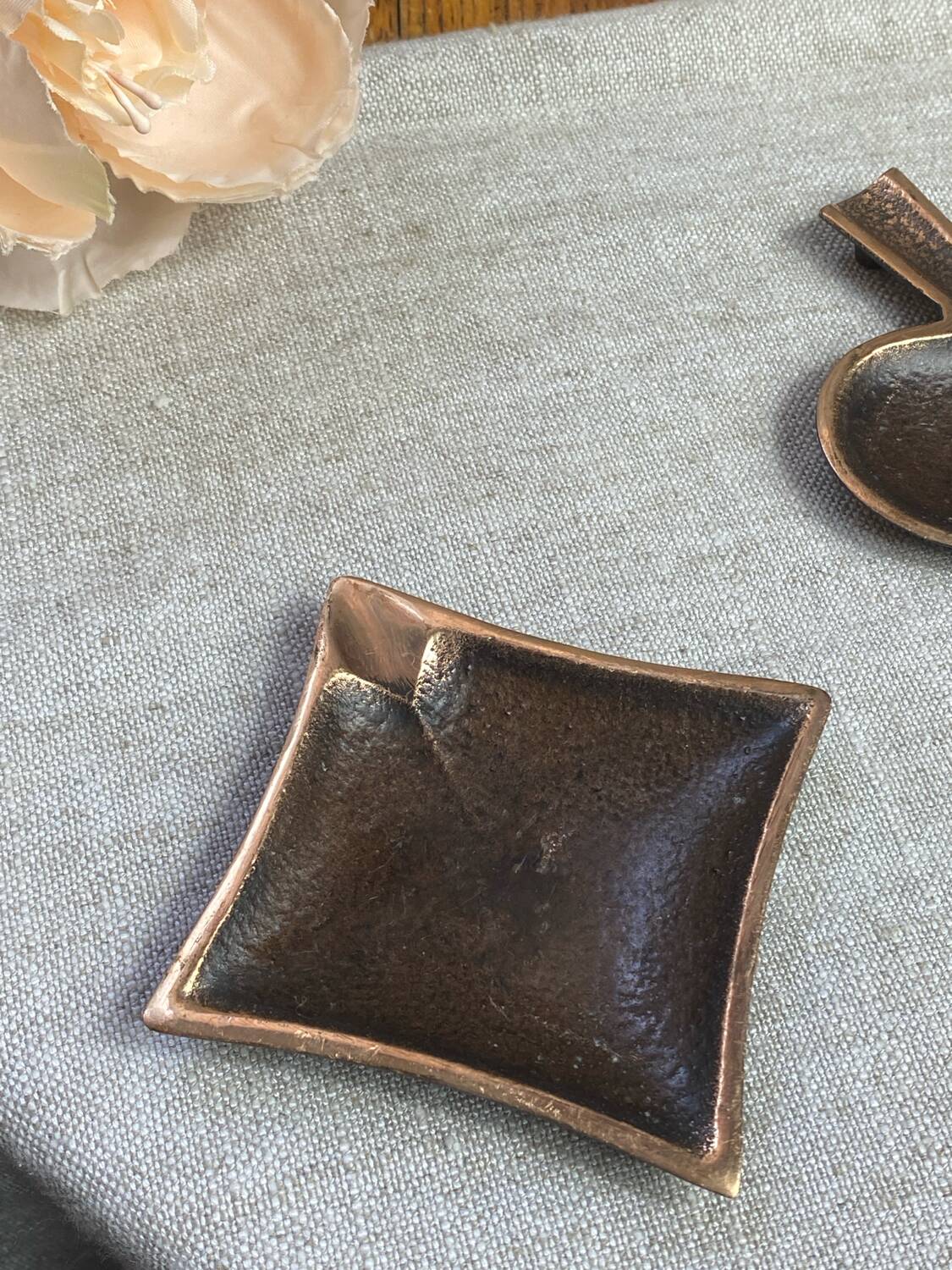 Bronze spade and diamond ashtrays