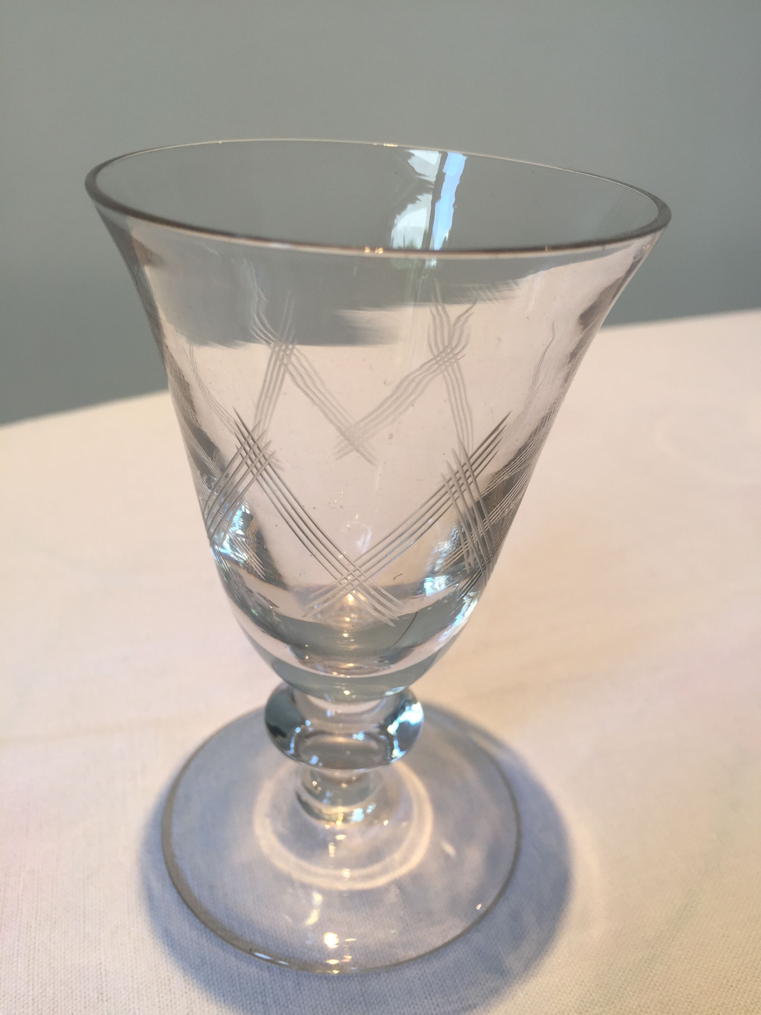 7 glasses to liquor on feet with geometric patterns