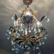 Antique Italian chandelier with cage and blue tassels