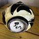 Vase en céramique jaune et noire à décor de feuilles, Vallauris signé JTF numéroté 519