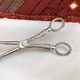 Wrought silver plated cake clips
