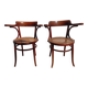 Paire de fauteuils cannés Fischel