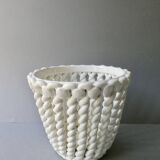 Openwork and braided ceramic pot cover