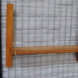 Wooden and metal wall shelf