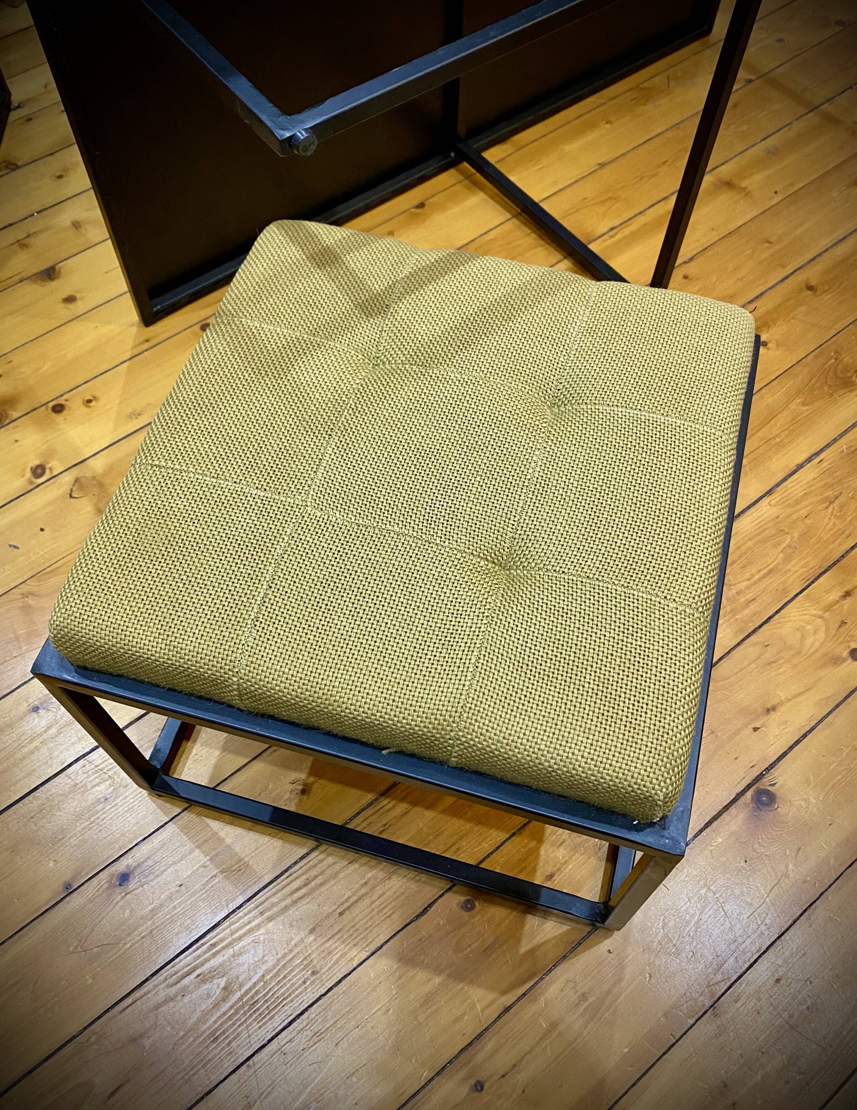 Mat black metal coffee table and 4 stackable stools.