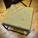 Mat black metal coffee table and 4 stackable stools.