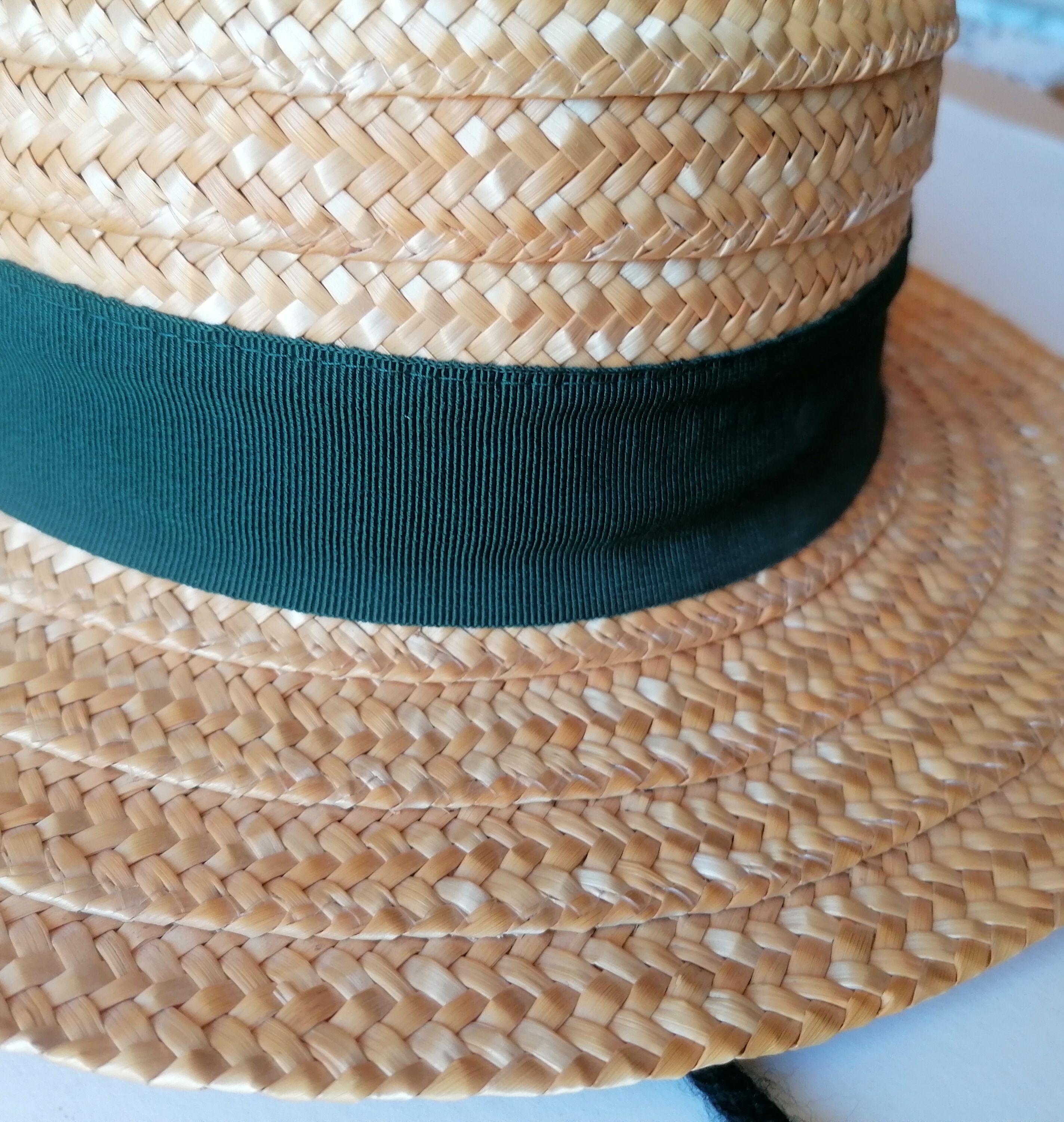 Canoe hat made of woven straw