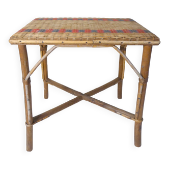 Old rattan side table