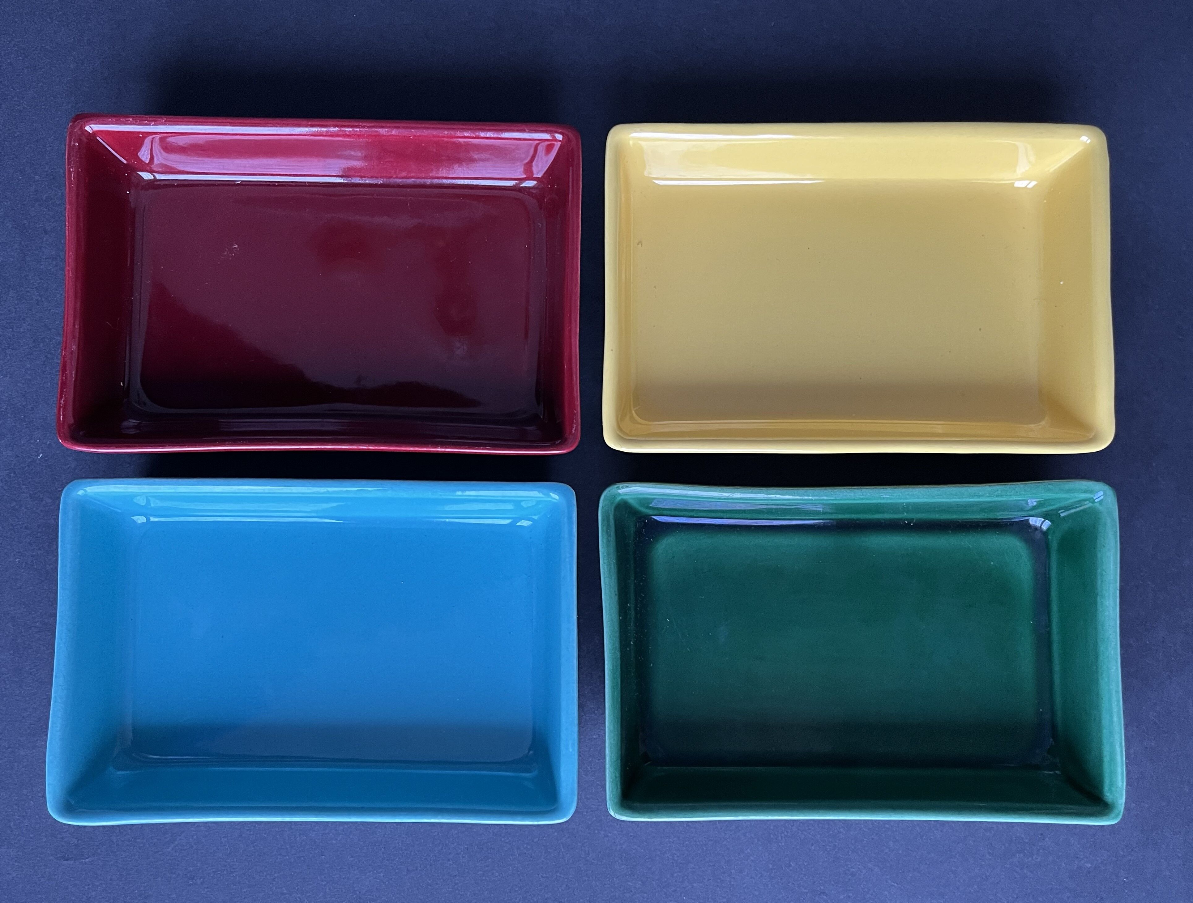 4 multicolored earthenware raviers