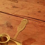 Old brass hand candle holder