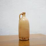 Vintage glazed terracotta bottle