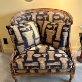 Armchair in a wooden confessional style with black and beige cotton.