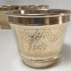 Three pot covers brass silver cover golden patina monogram early twentieth century