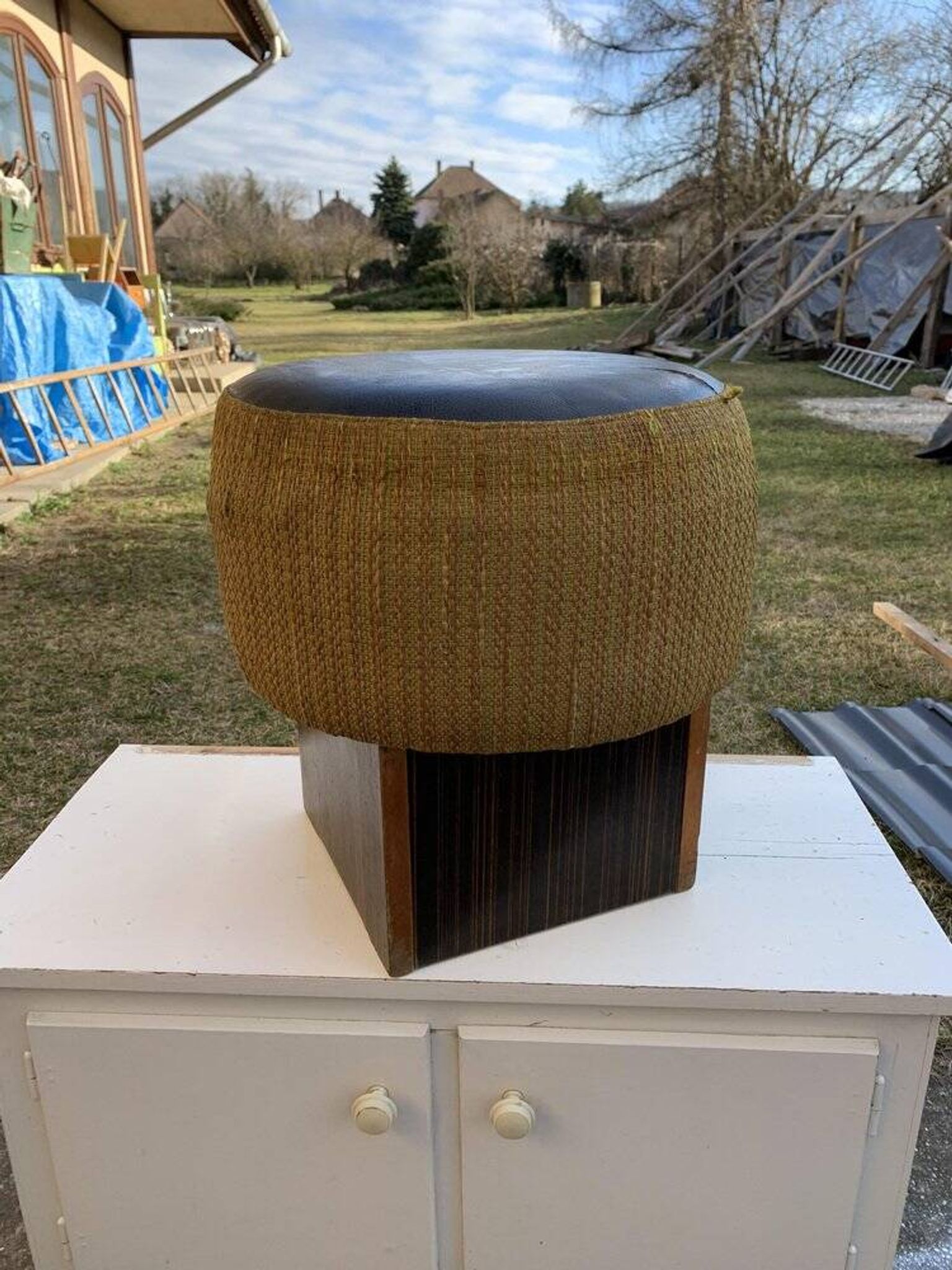 Black hexagonal pouf in fabric and faux leather, mid-century Hungarian ottoman from the 1950s.
