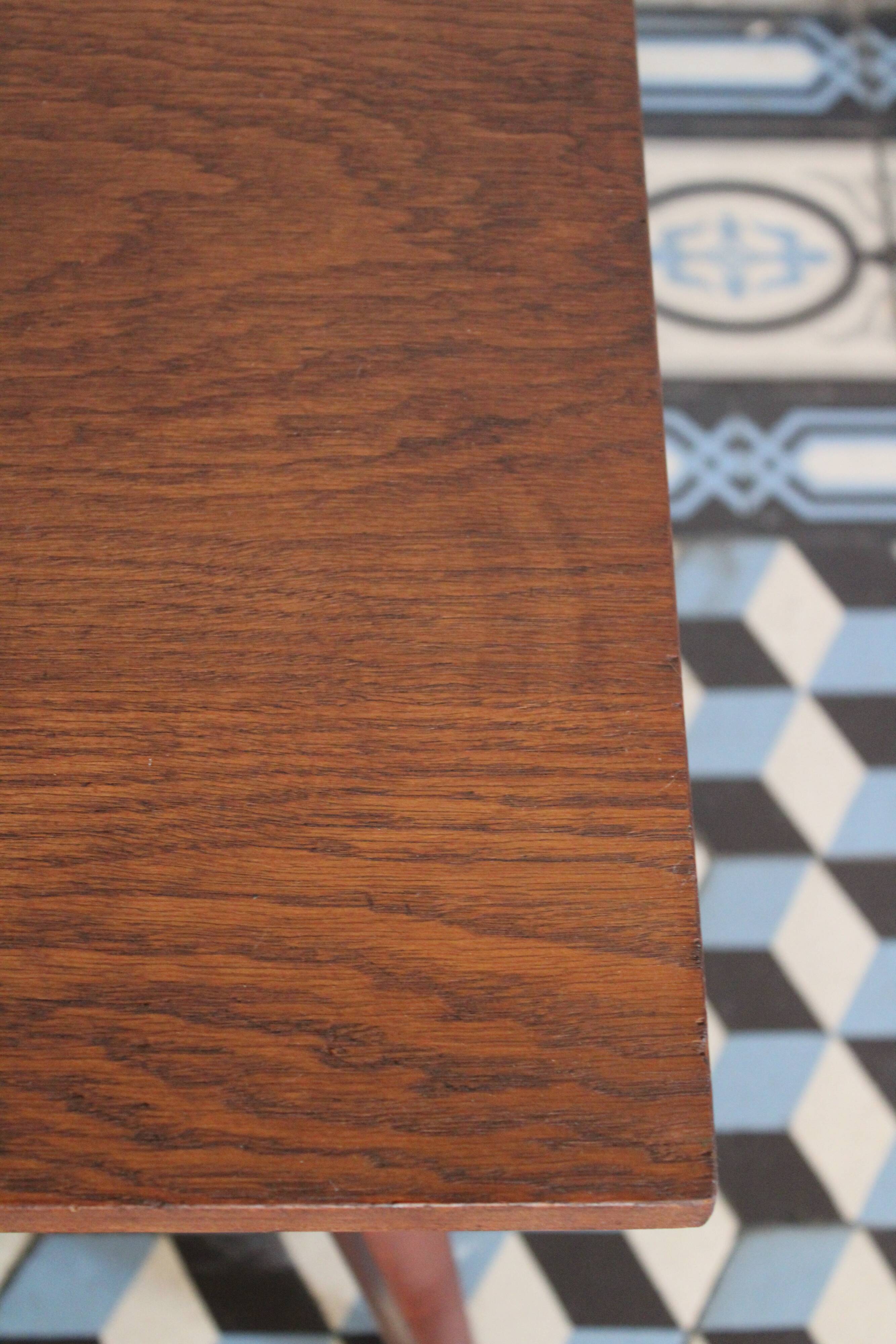 Teak coffee table with compass feet