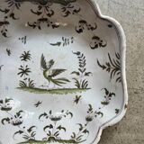 Moustiers salad bowl in cream and green earthenware, 18th century.