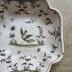 Moustiers salad bowl in cream and green earthenware, 18th century.