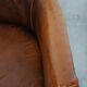 Amazing cognac-coloured sheepskin dining/side chair with armrests