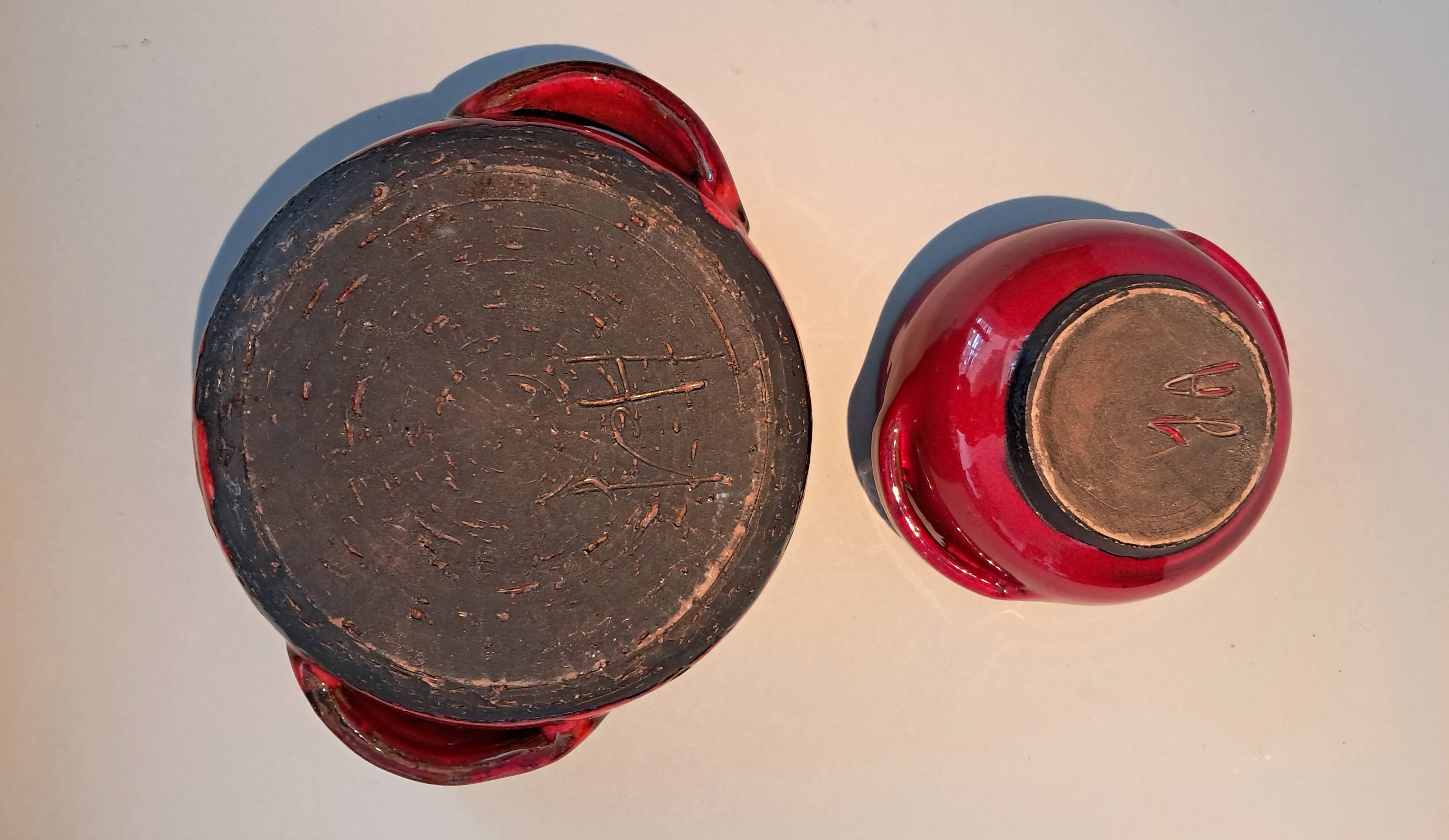 Red ceramic pieces by Gérard Hoffman (1917/1965).