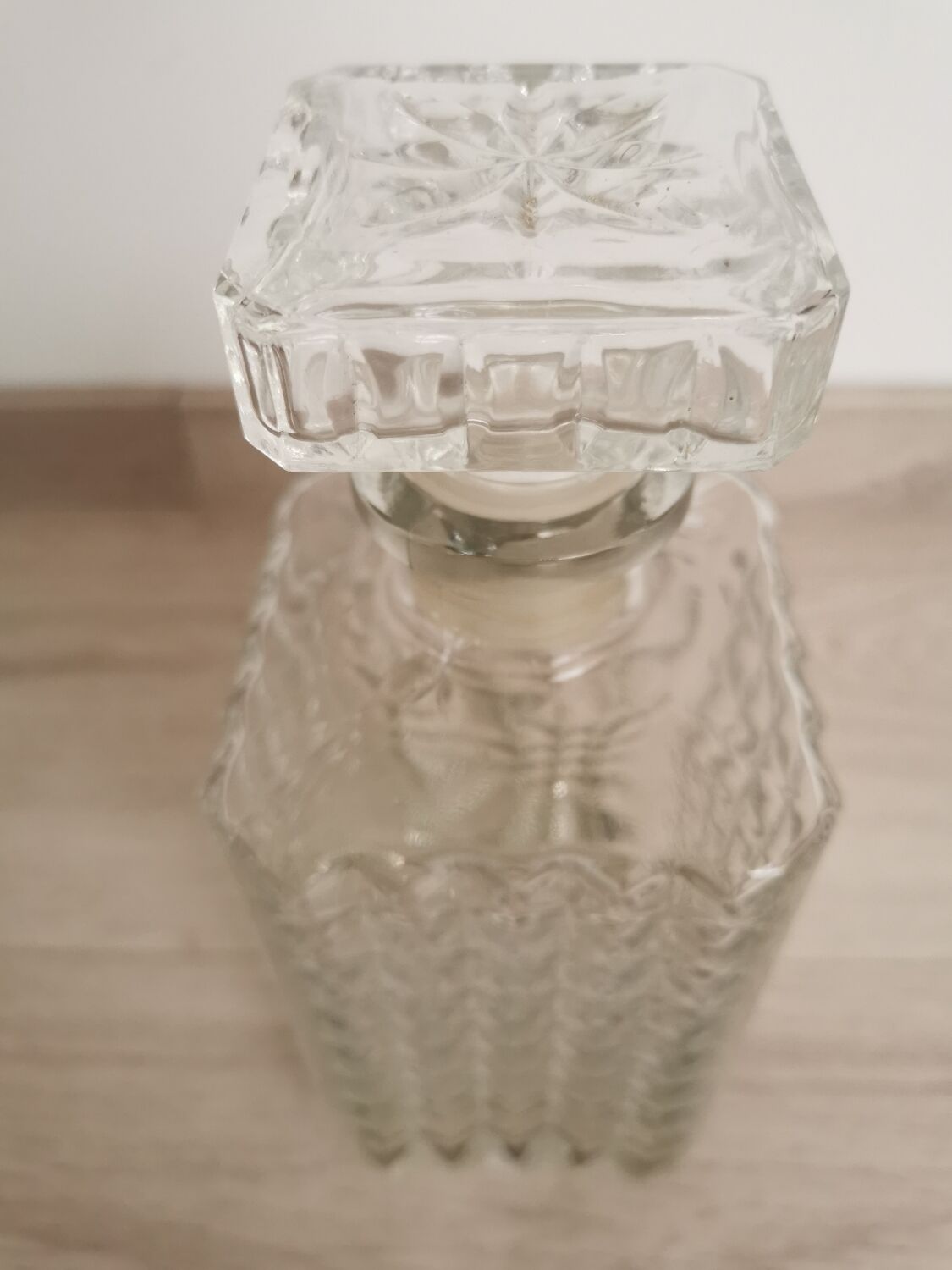Carved old whisky decanter