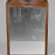 Miroir trumeau Art Nouveau sculpté de vigne, en noyer et loupe