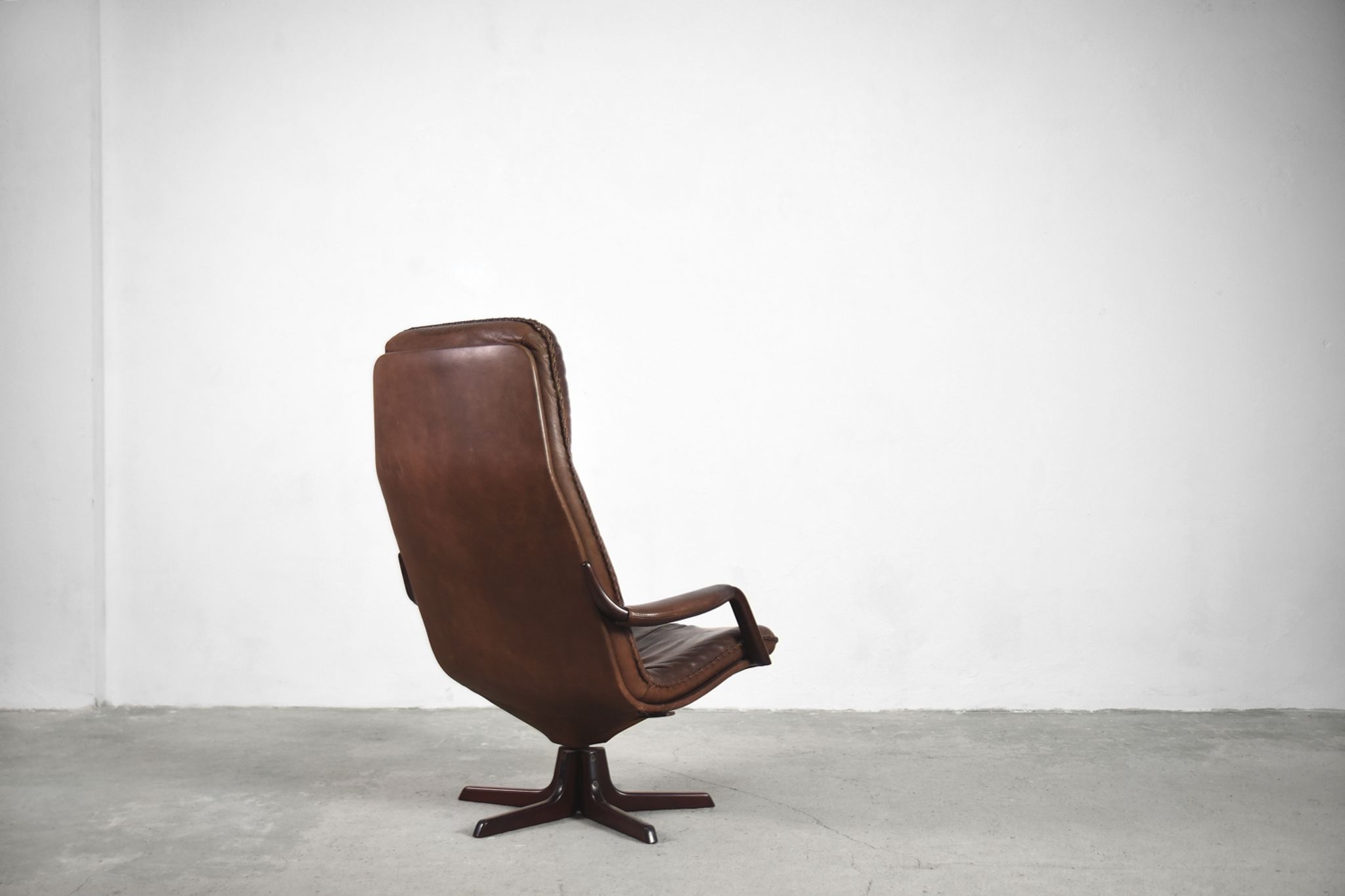 Danish patinated leather adjustable easy chair and ottoman by Berg Furniture, 1970s