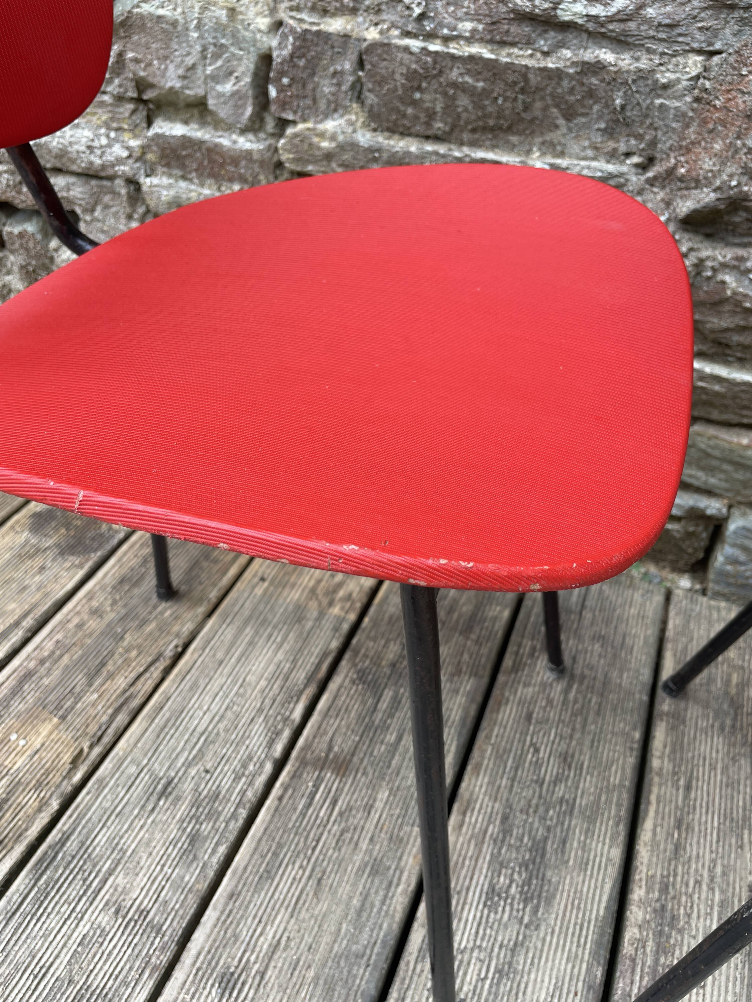 Pair of faux leather chairs from the 1950s/60s.