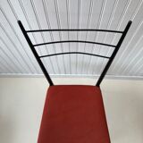 Red metal chairs from the 60s
