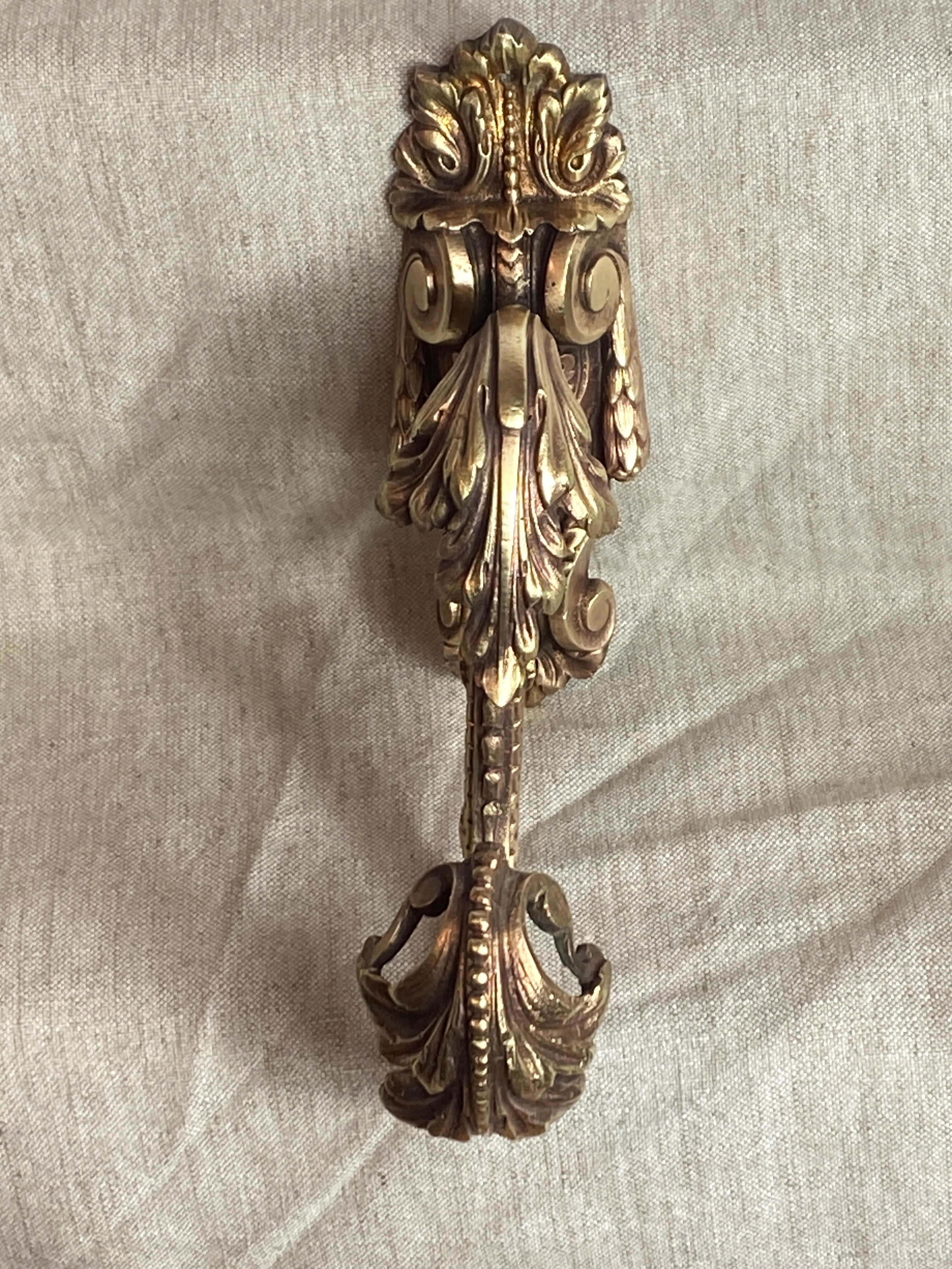 Golden bronze coat hook, 19th century