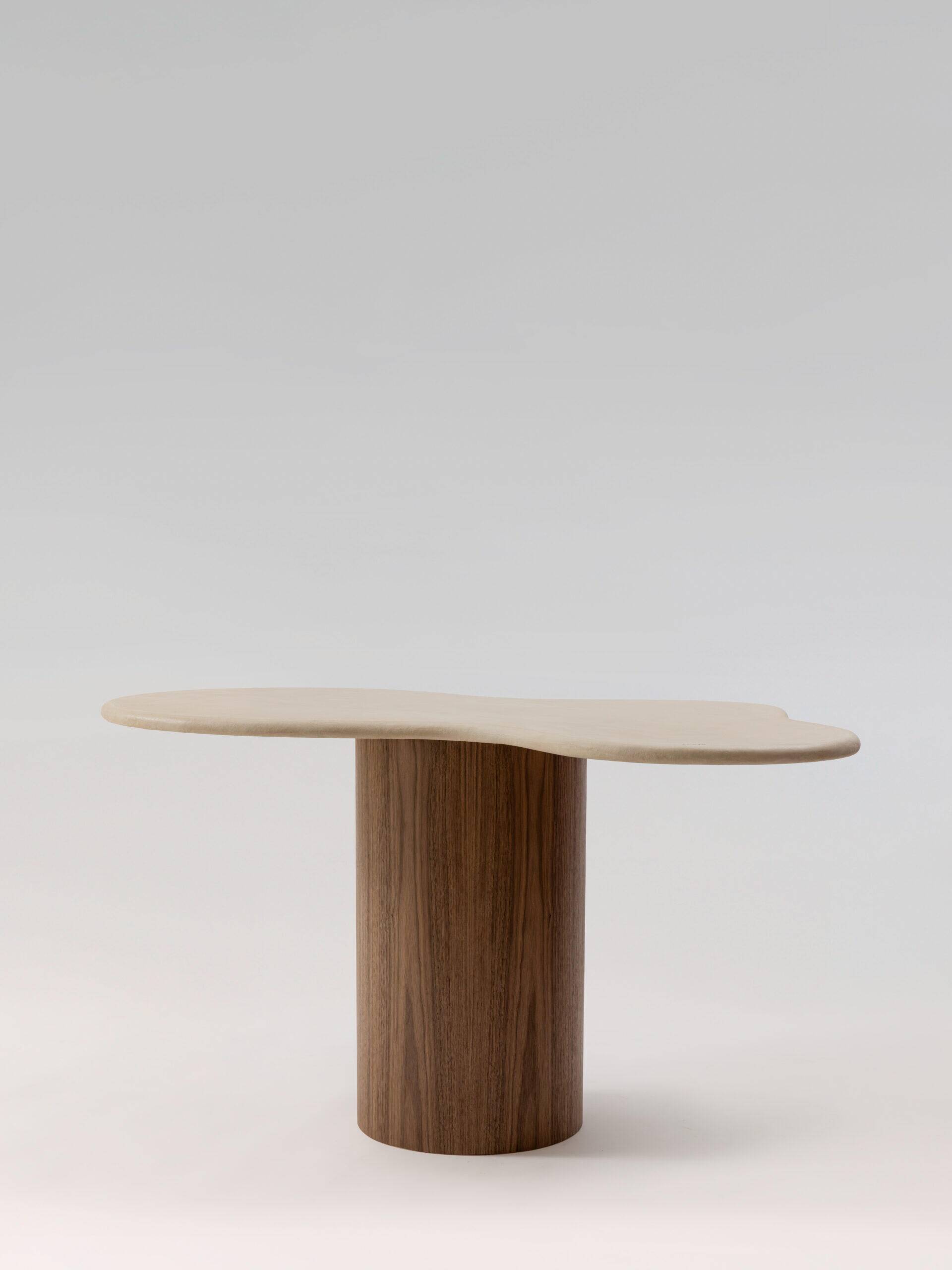 Teā dining table with walnut legs