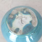 Ball vase with blue drippings