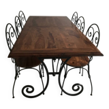 Wrought iron table with wooden top and 6 chairs