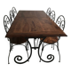 Wrought iron table with wooden top and 6 chairs
