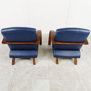 Paire de fauteuils en bois courbé et cuir bleu, années 1970