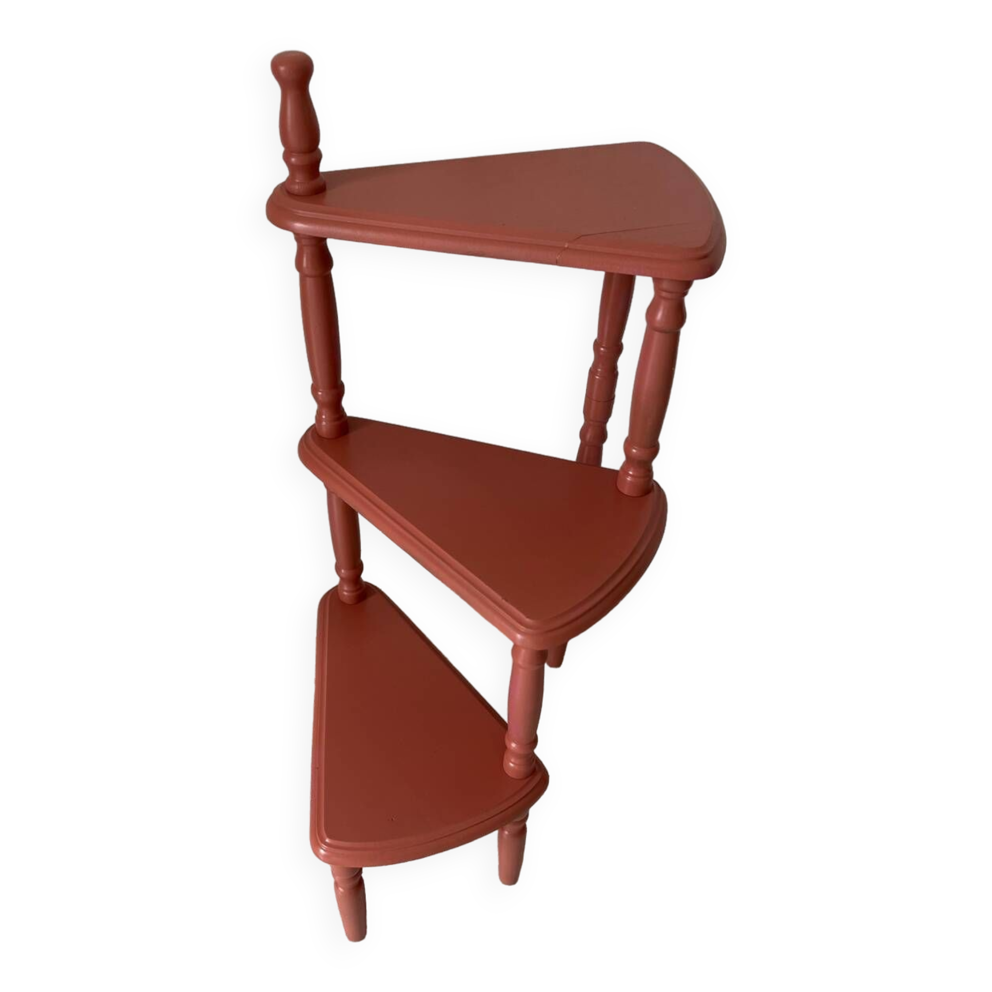 Old plant holder repainted in terracotta