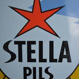 Stella Pils beer enamelled plate