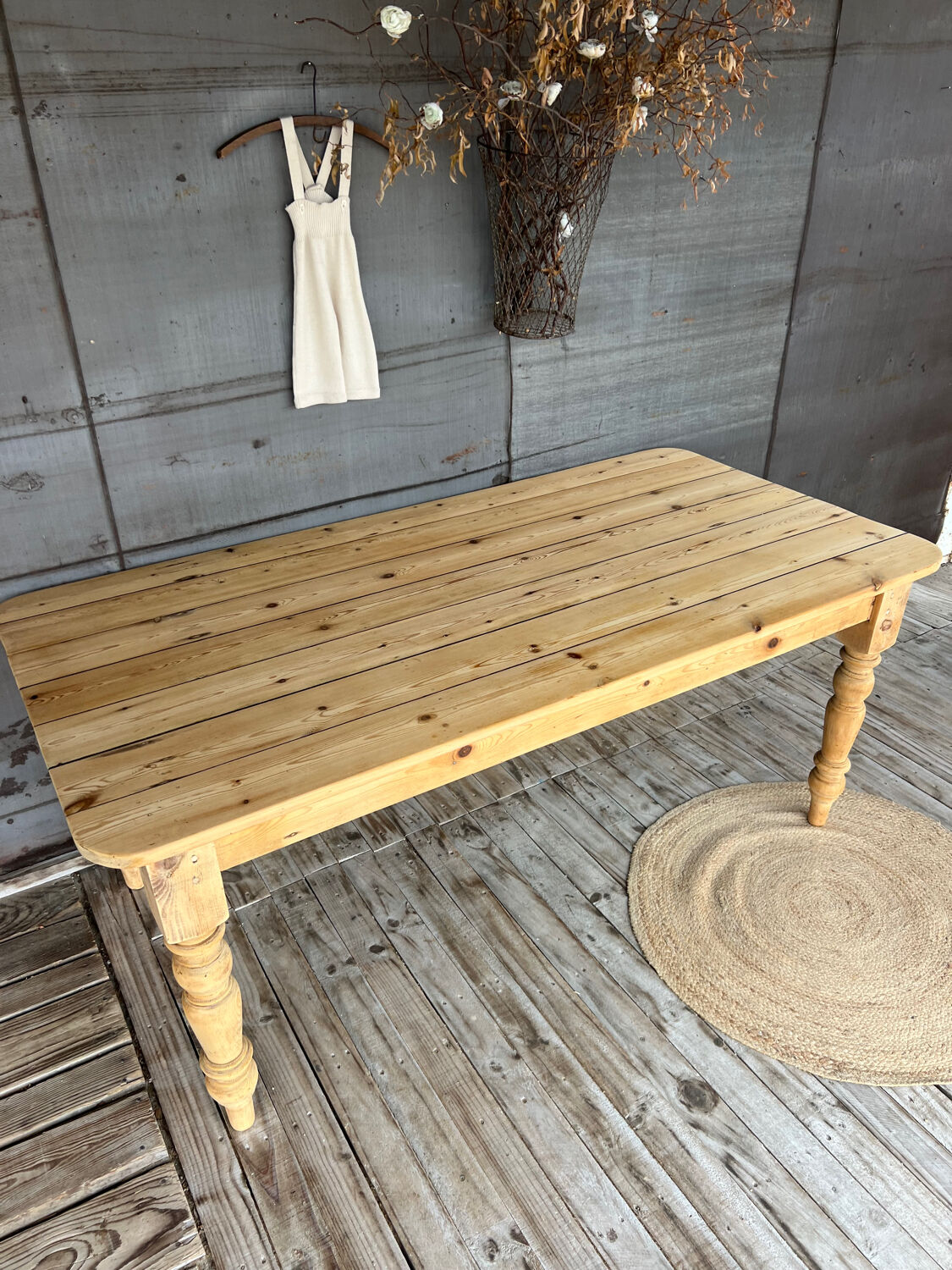 Old farmhouse table in raw wood