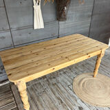 Old farmhouse table in raw wood