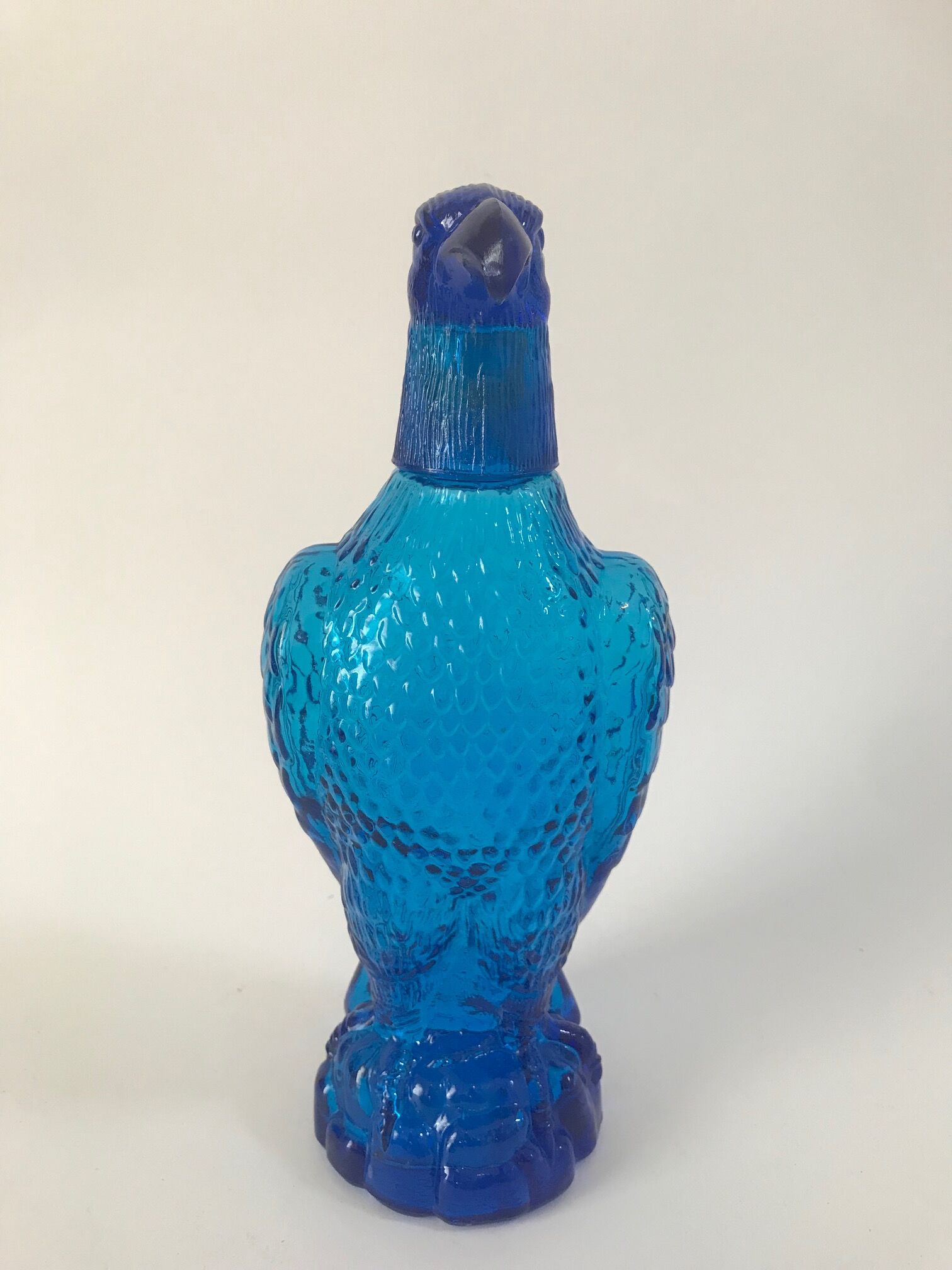 Bottle forming an eagle