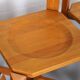 Set of 4 dining chairs in elm wood and cognac leather.