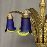 Solid bronze Art Deco style chandelier with iconic handmade lampshades.