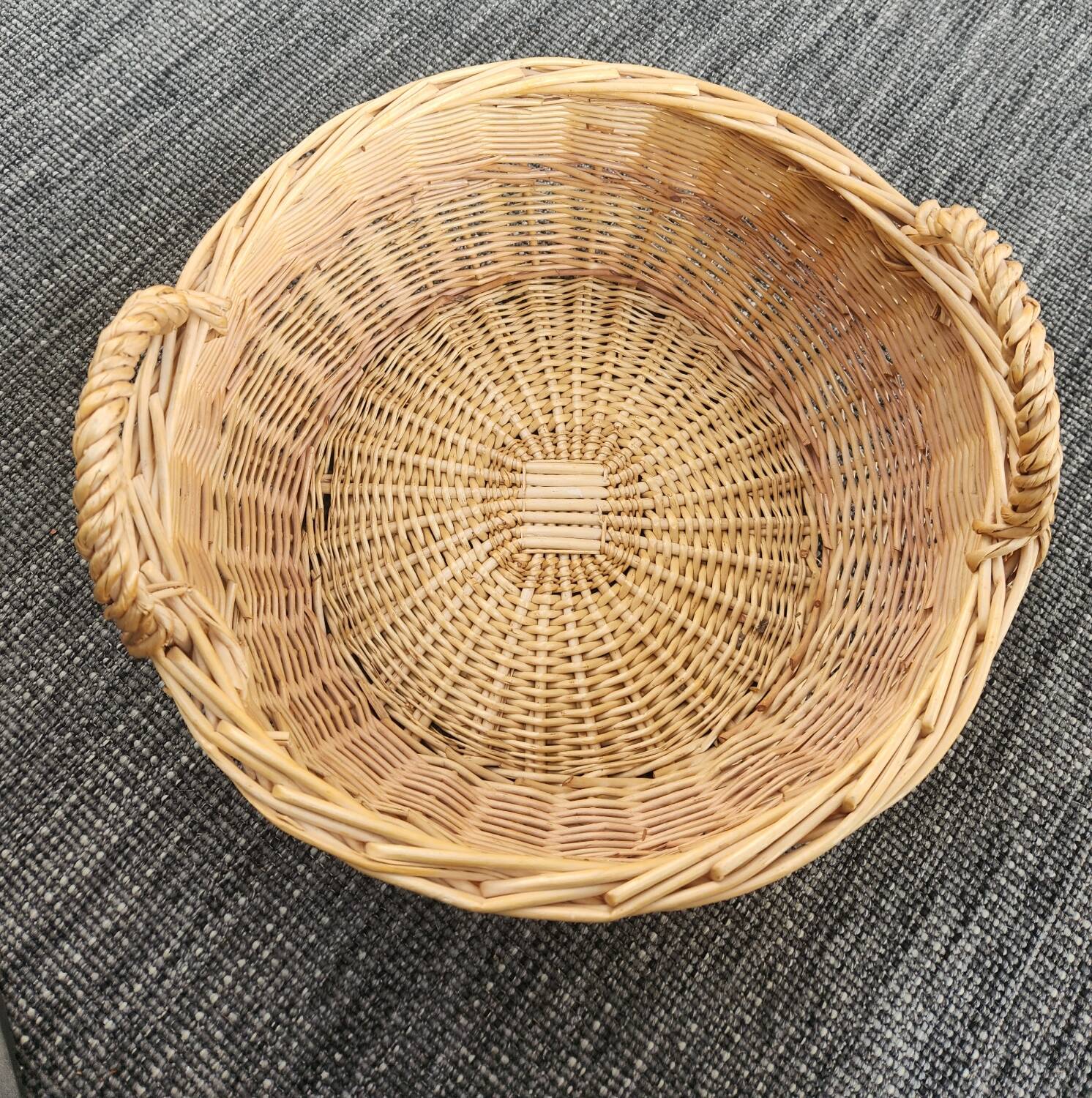 Large round wicker basket with handles