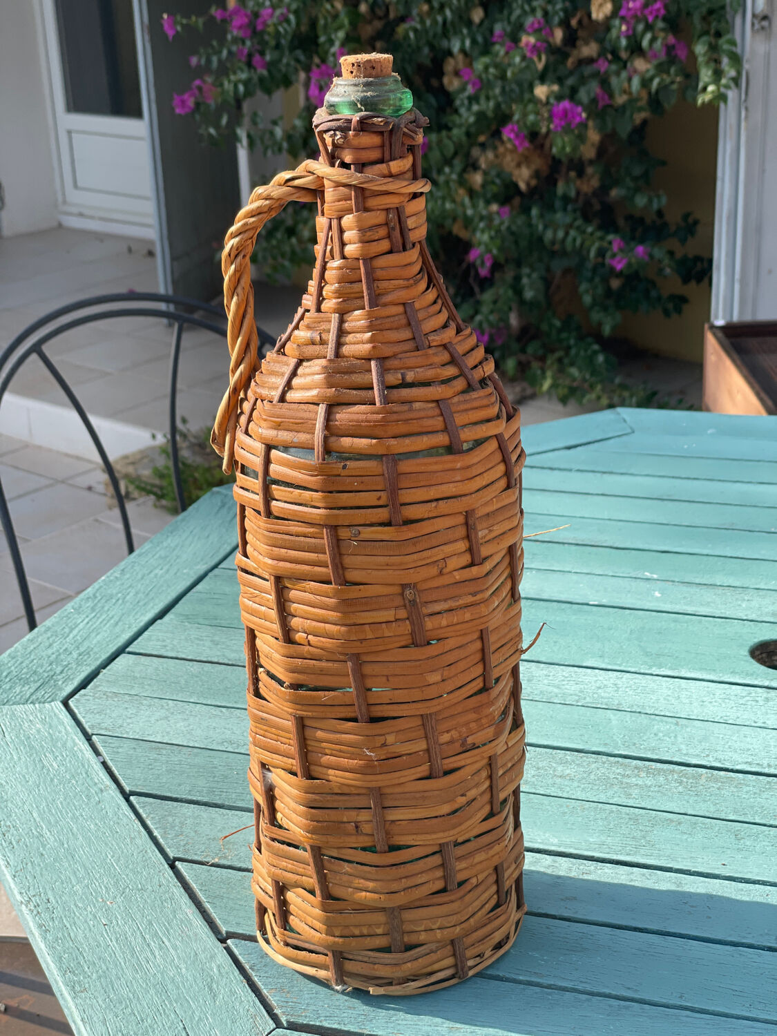 Old wicker bottle