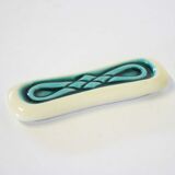 Set of twelve turquoise ceramic knife holders
